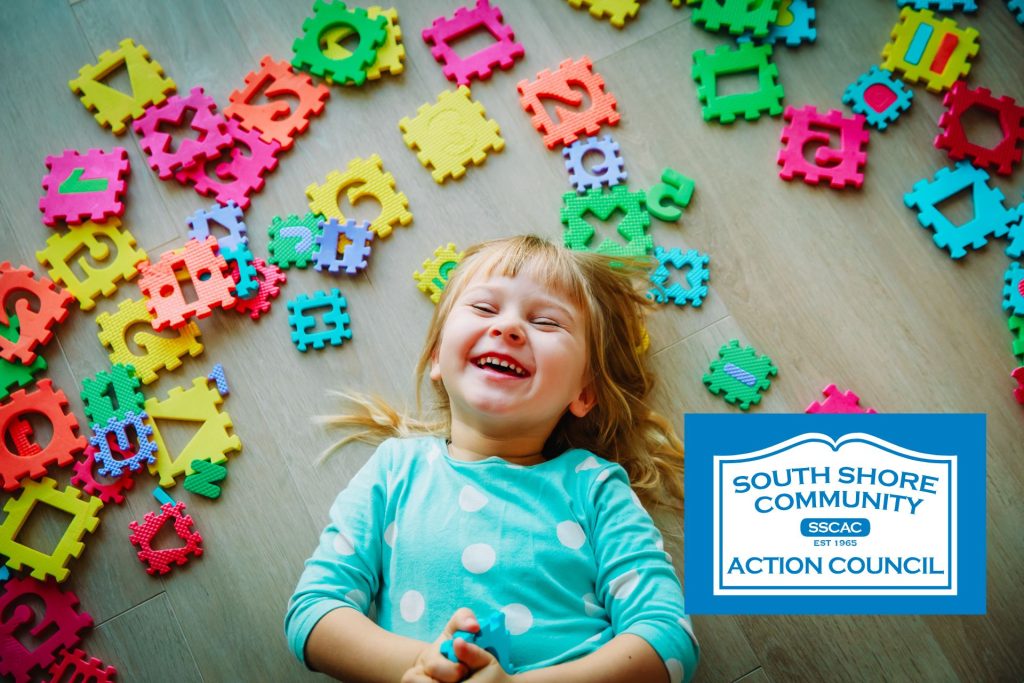 A young child smiling